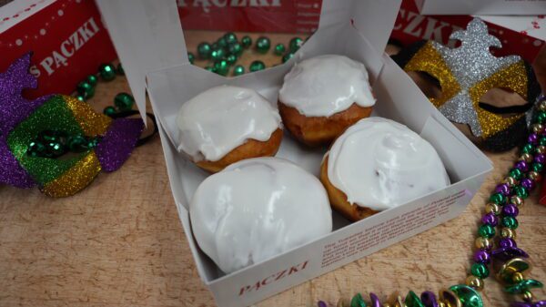 white frosting paczki, raspberry filling